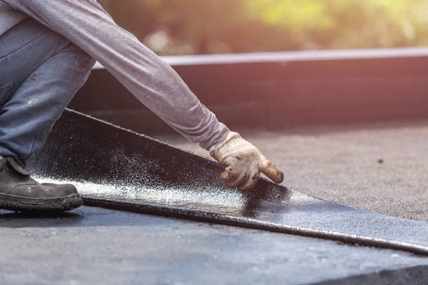 Professional Basement Waterproofing technician working in Paris, VA